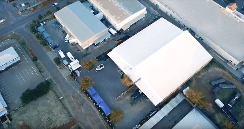 high level aerial shot of Kal Tire Warehouse